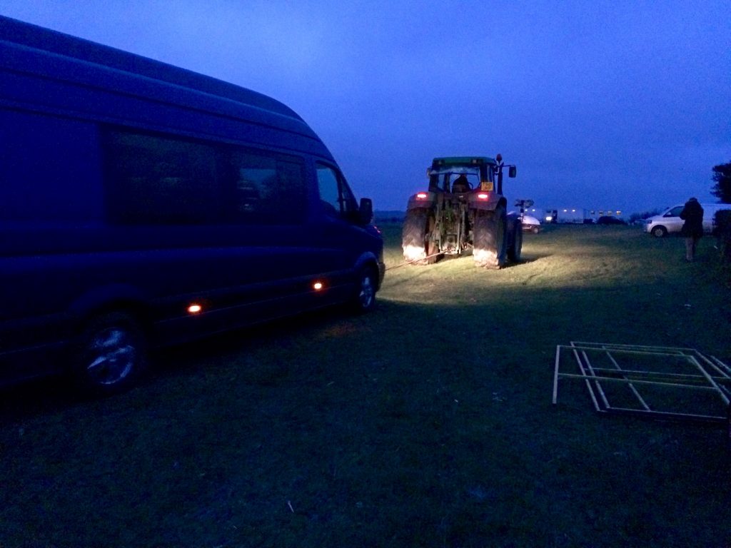 Tractor towing out shoot crew vehicles 